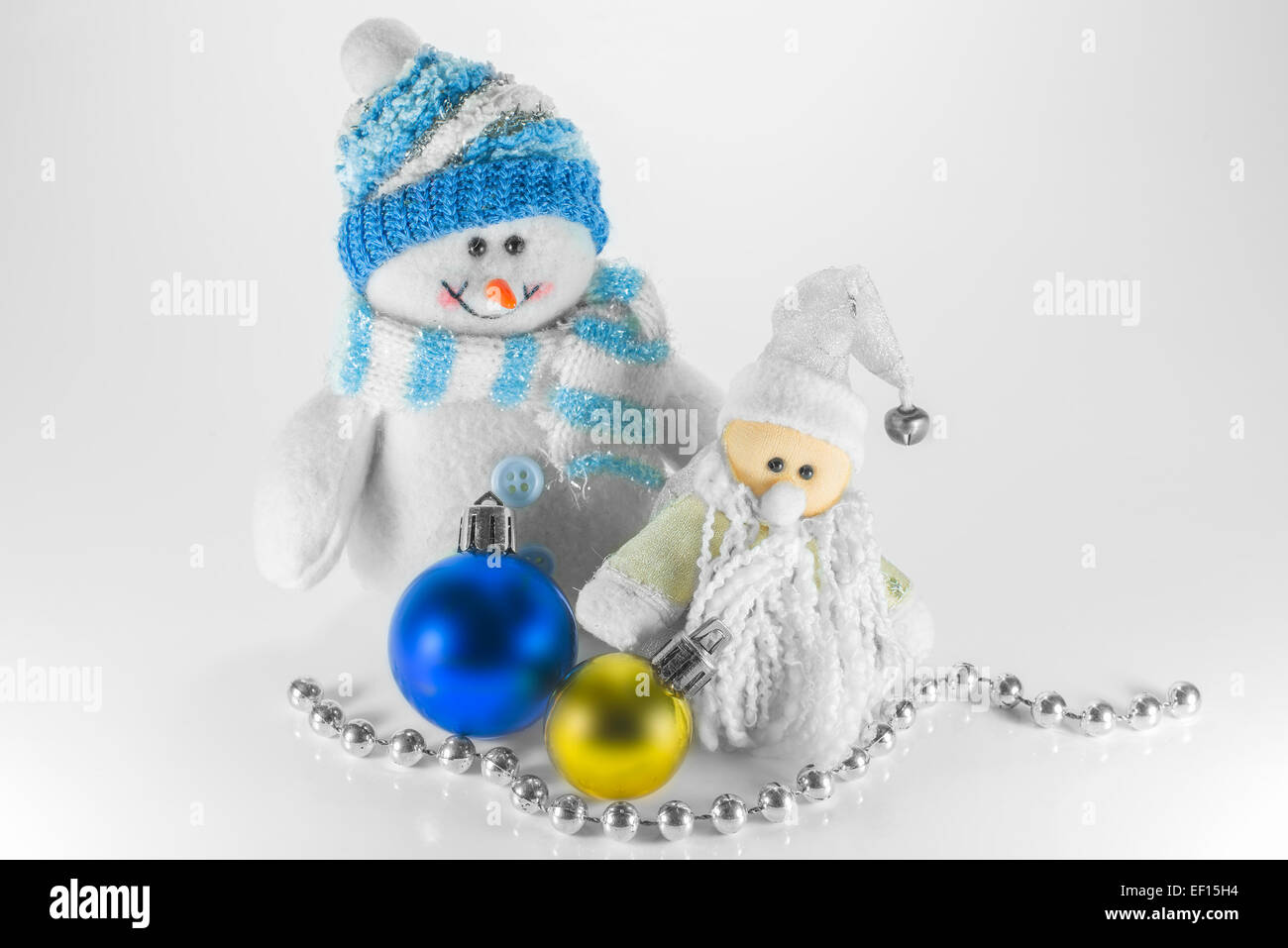 toy snowman and Christmas decorations Stock Photo