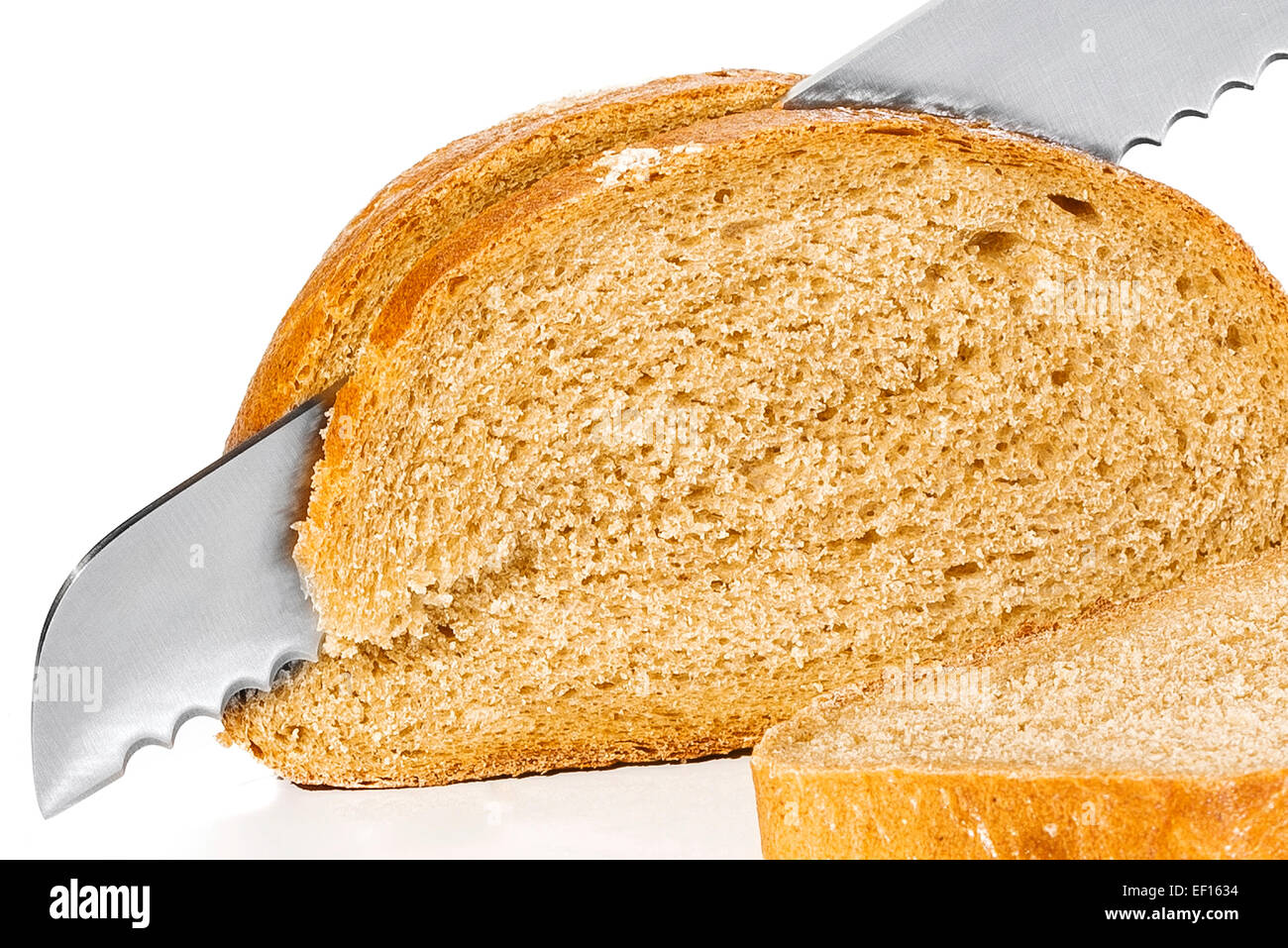 delicious bread and knife stuck Stock Photo - Alamy
