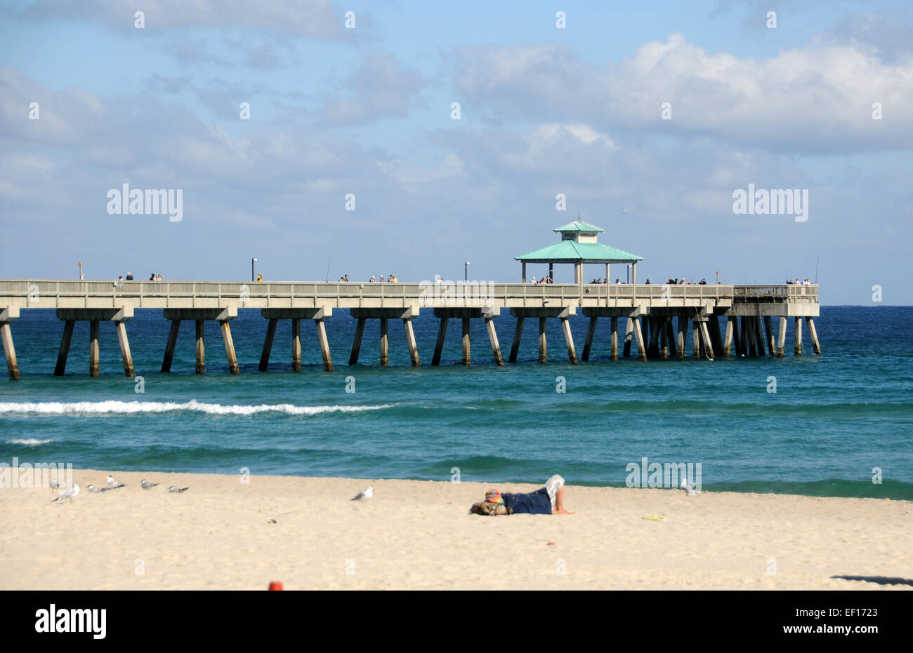 Pier with tourists on the South Florida coastline Stock Photo