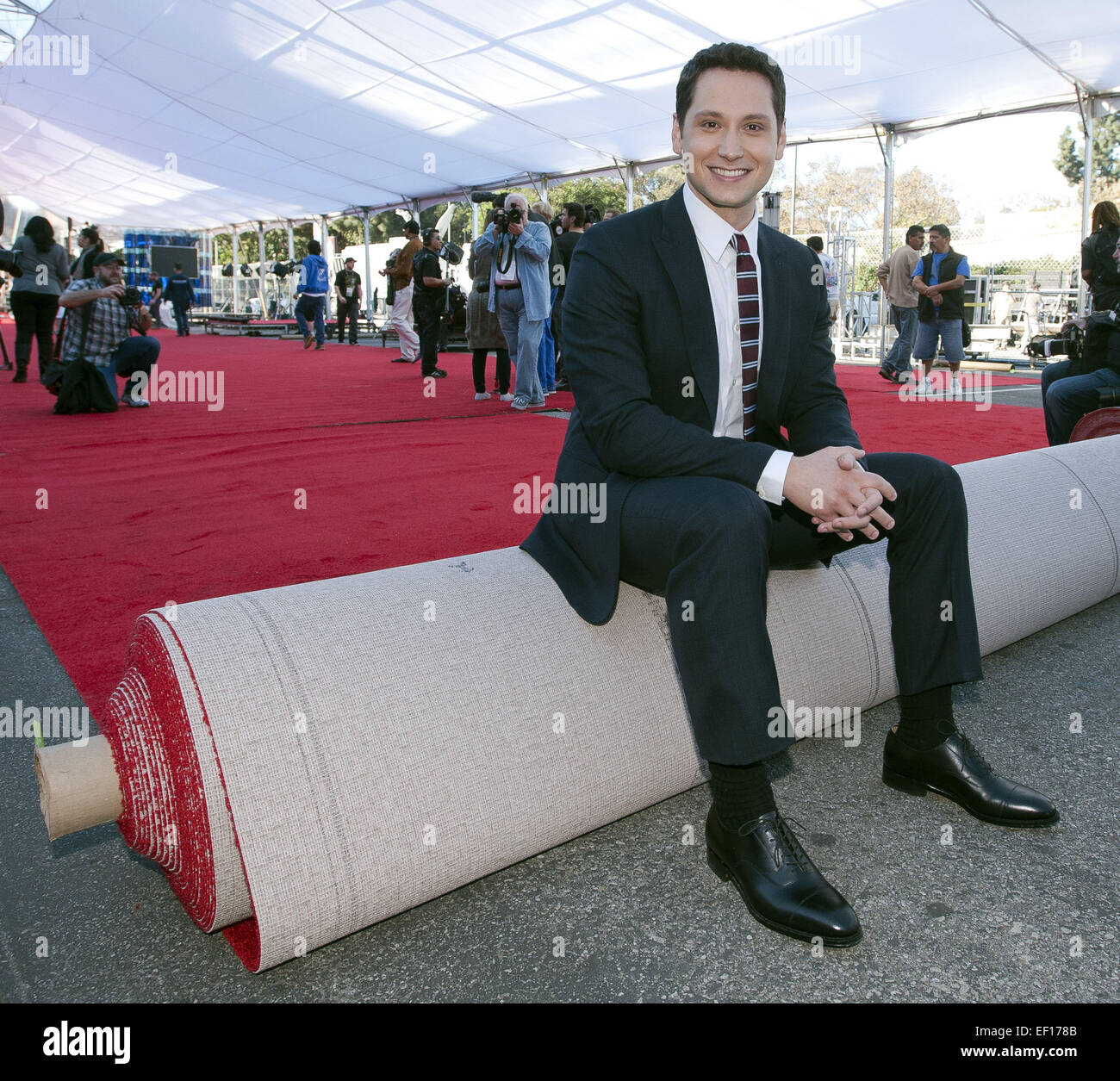 Los Angeles, California, USA. 24th Jan, 2015. American actor Matt McGorry poses for the news media after rolling out the red carpet on Saturday morning.----The 21st Annual 2015 Screen Actors Guild Awards preparations were underway at the Shrine Auditorium in Los Angeles as workers set up tents, stages, bleachers and displays on Saturday. American actor Matt McGorry, 'Orange is the New Black' nominee, led the ceremonial rolling out of the red carpet with Local 33 Props and Carpenters, Local 800, Art Directors as well as Sag Award Comittee Vice Chair Daryl Anderson and American actor Woody Sch Stock Photo