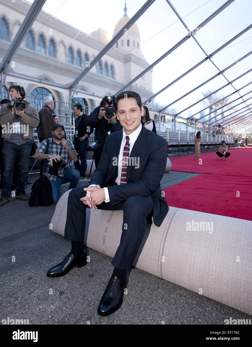 Los Angeles, California, USA. 24th Jan, 2015. American actor Matt McGorry poses for the news media after rolling out the red carpet on Saturday morning.----The 21st Annual 2015 Screen Actors Guild Awards preparations were underway at the Shrine Auditorium in Los Angeles as workers set up tents, stages, bleachers and displays on Saturday. American actor Matt McGorry, 'Orange is the New Black' nominee, led the ceremonial rolling out of the red carpet with Local 33 Props and Carpenters, Local 800, Art Directors as well as Sag Award Comittee Vice Chair Daryl Anderson and American actor Woody Sch Stock Photo
