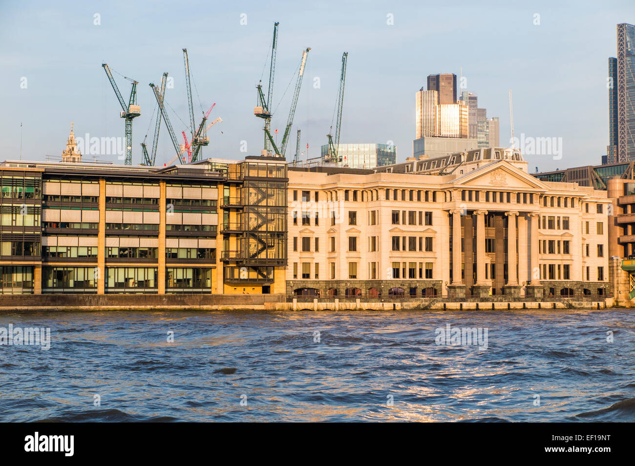 View of Stanhope tower cranes on the London skyline on the Bloomberg Place development site, City of London, EC4, Vintners Place and River Thames Stock Photo