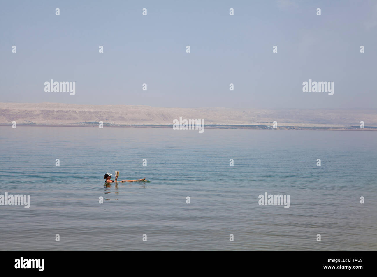 Relaxing in the dead sea. Stock Photo