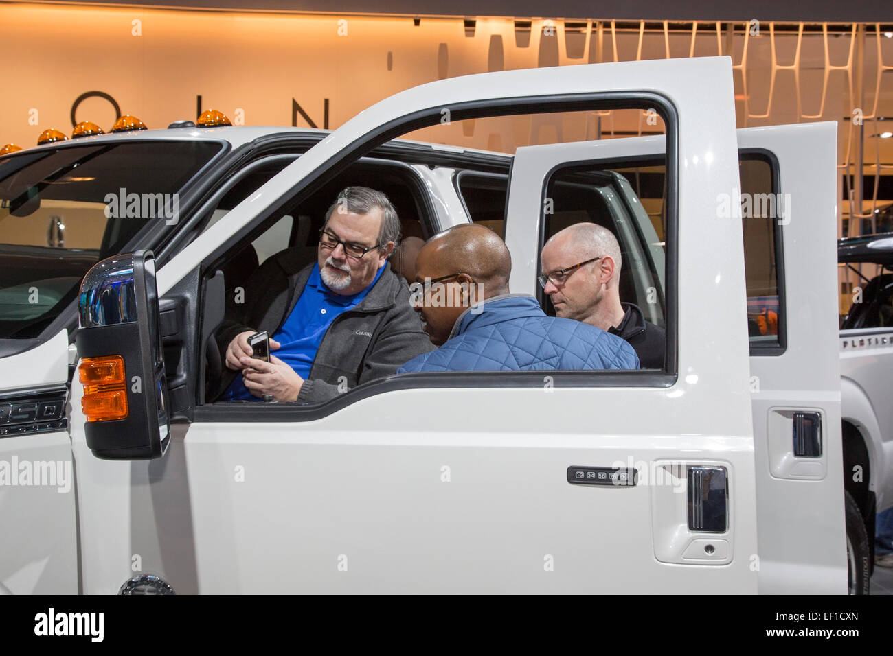 Detroit, Michigan - Visitors to the North American International Auto Show inspect the Ford F-350 Super Duty truck. Stock Photo