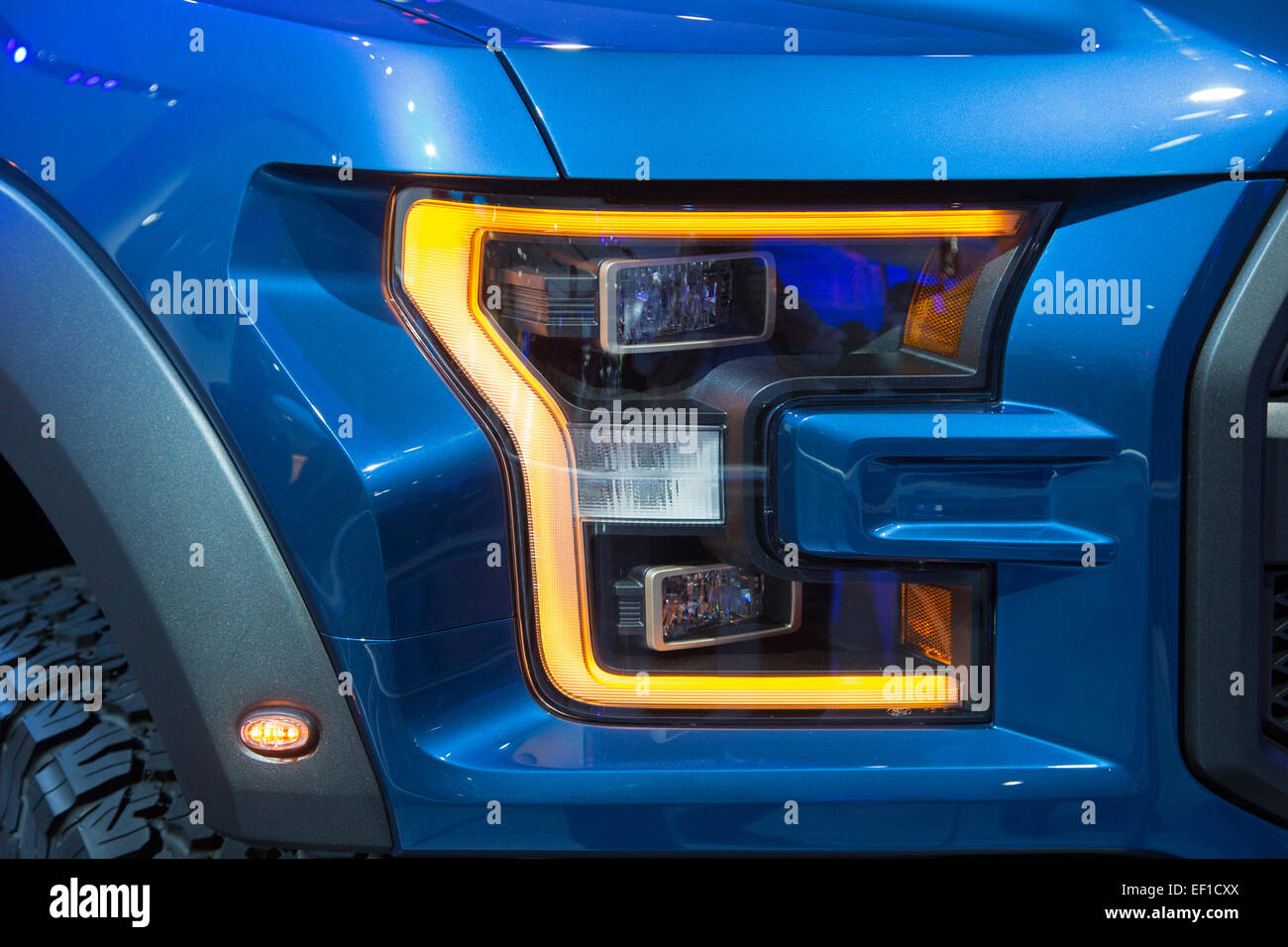 Detroit, Michigan - Headlight of the Ford F-150 Raptor aluminum body pickup truck on display at the Detroit auto show. Stock Photo