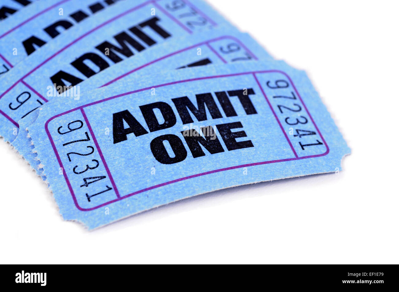 Several blue admit one cinema tickets isolated on a white background. Stock Photo