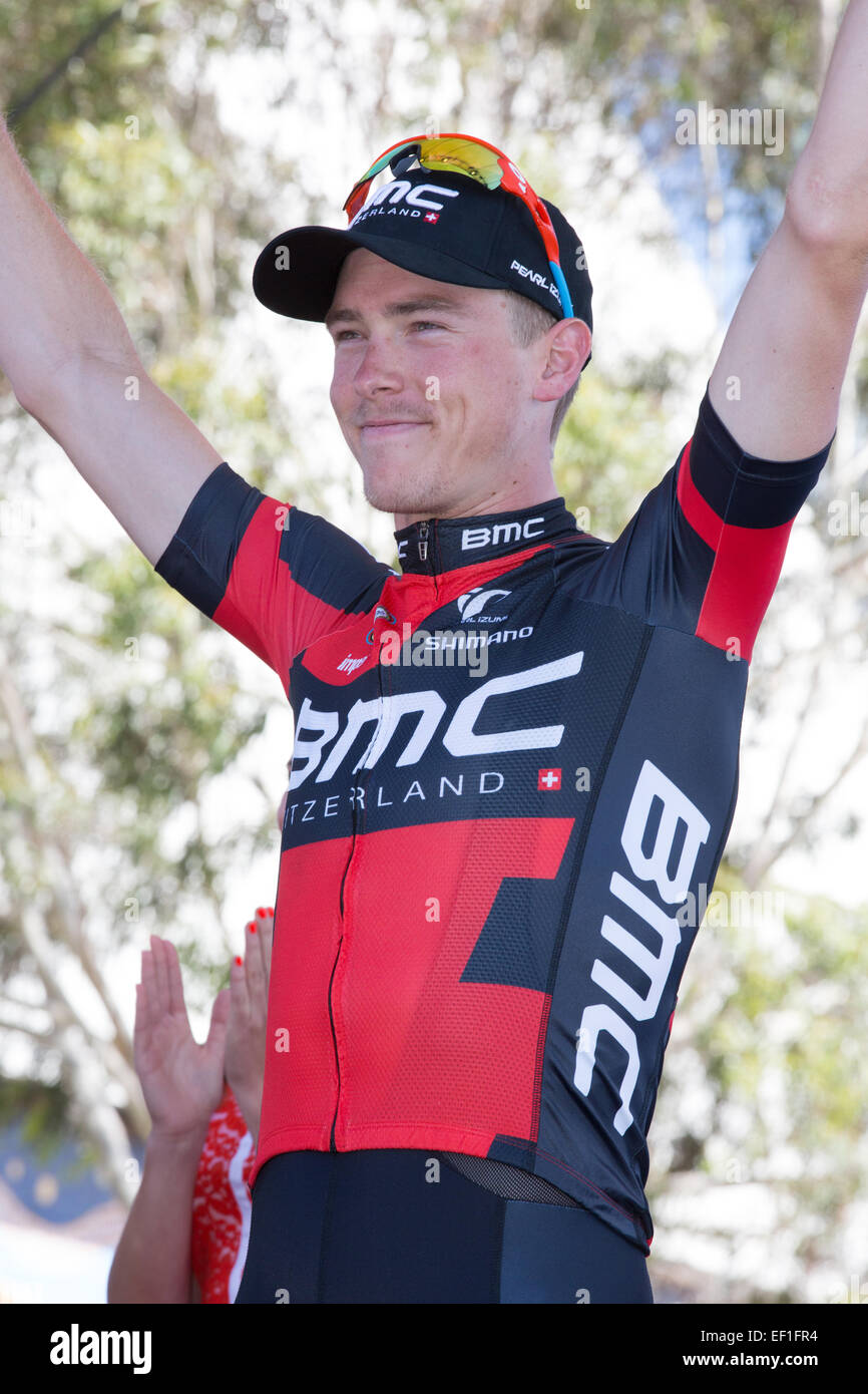 Rohan Dennis (AUS) from BMC Racing Team (USA) on stage to accept his trophy as the winner of the 2015 Tour Down Under. Stock Photo