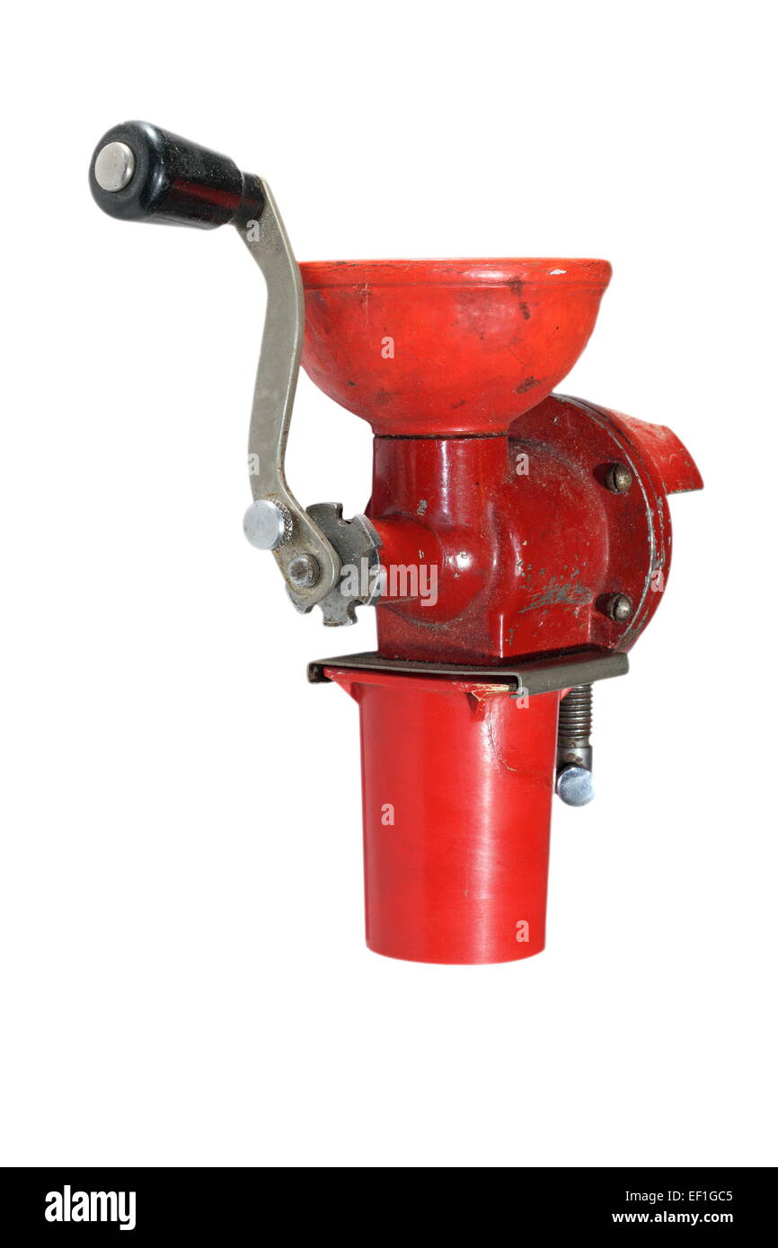 old manual red meat grinder isolated over white background Stock Photo