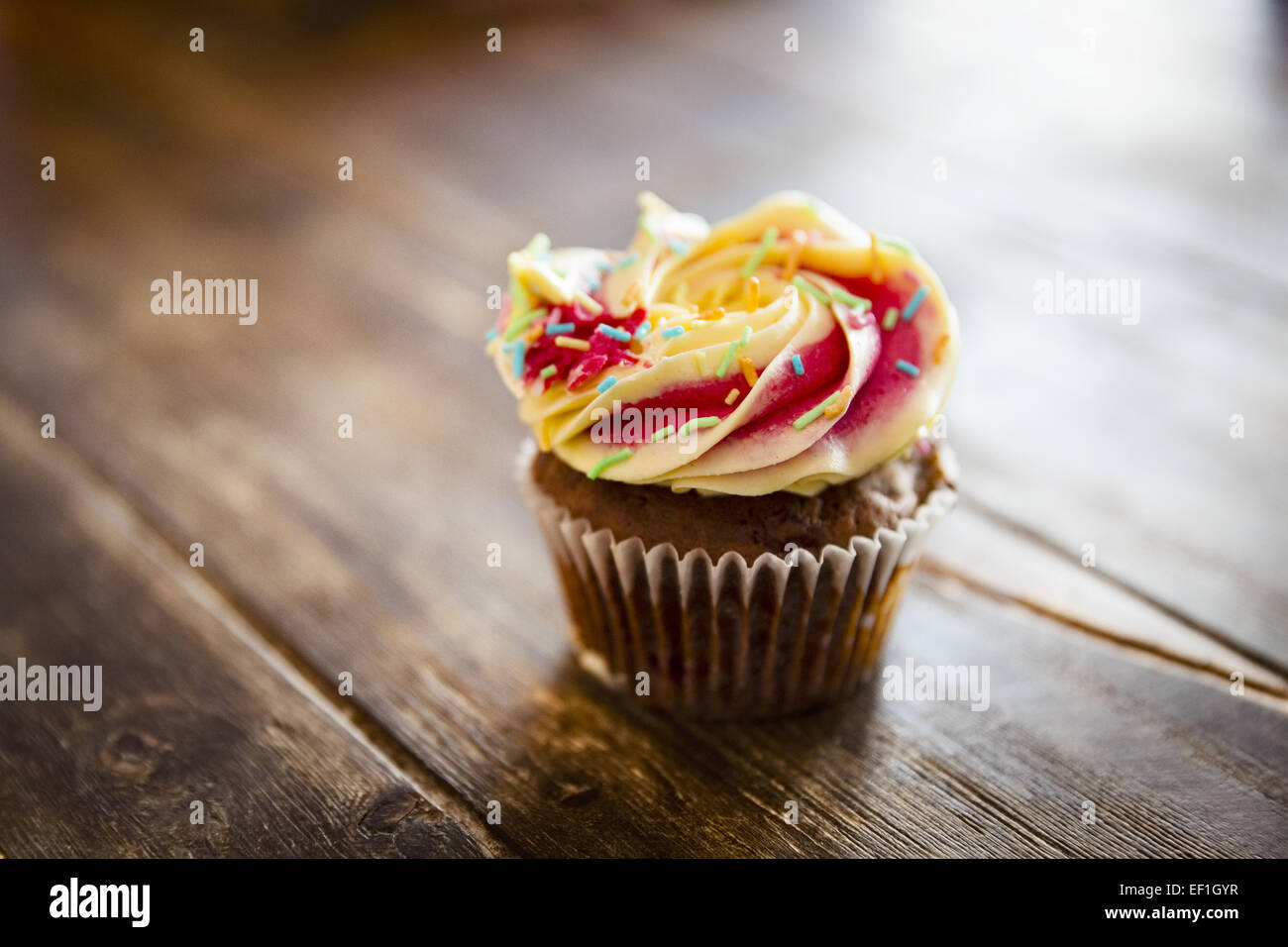 Sweet and tasteful cup cake with chocolate. and sprikles Stock Photo
