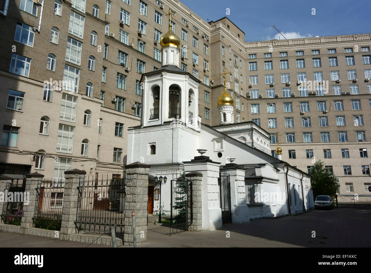 Old church and a modern apartment block, Moscow, Russia Stock Photo