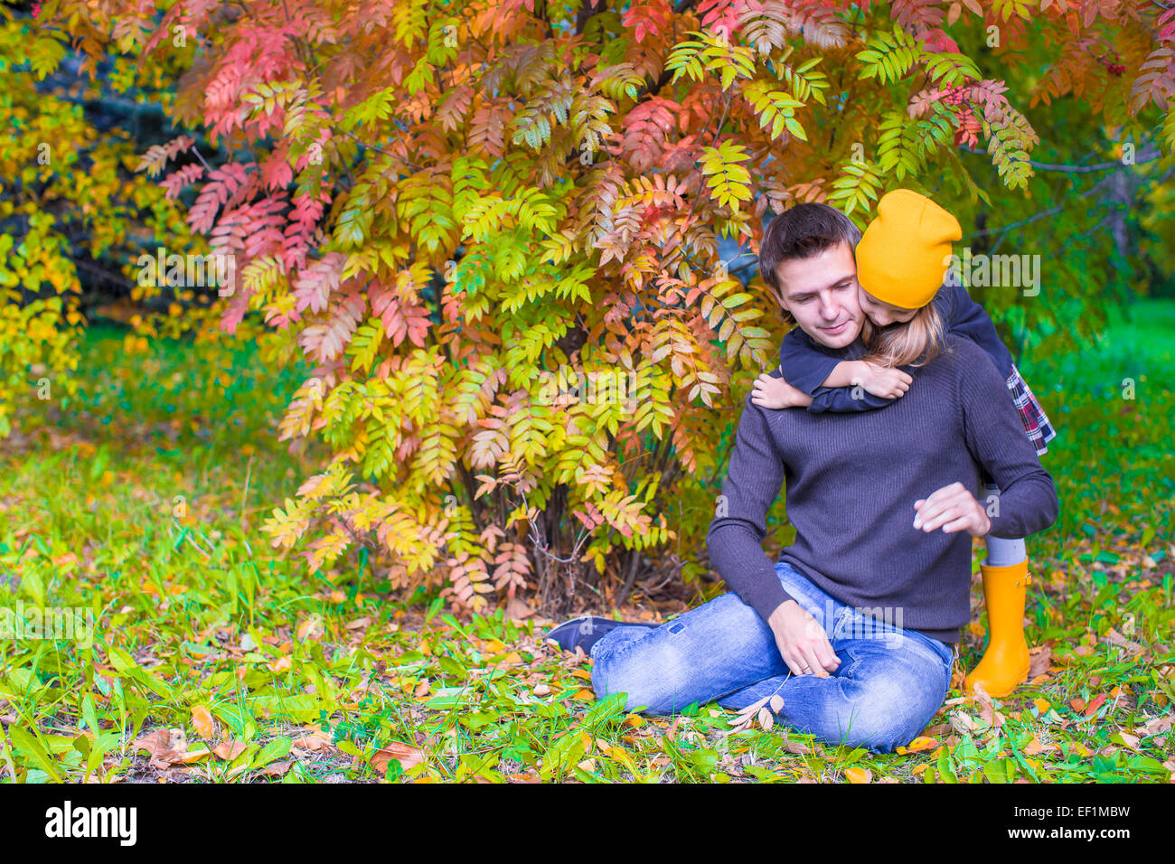 Father with cute daughter in autumn park outdoors Stock Photo - Alamy