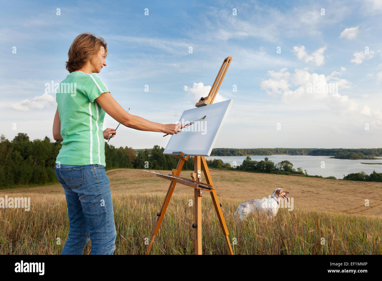 artist painting an sea landscape Stock Photo