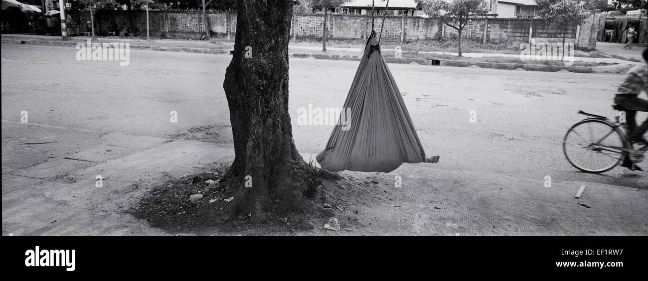 Child sleeping in a sling. Yangon, Myanmar Stock Photo Alamy