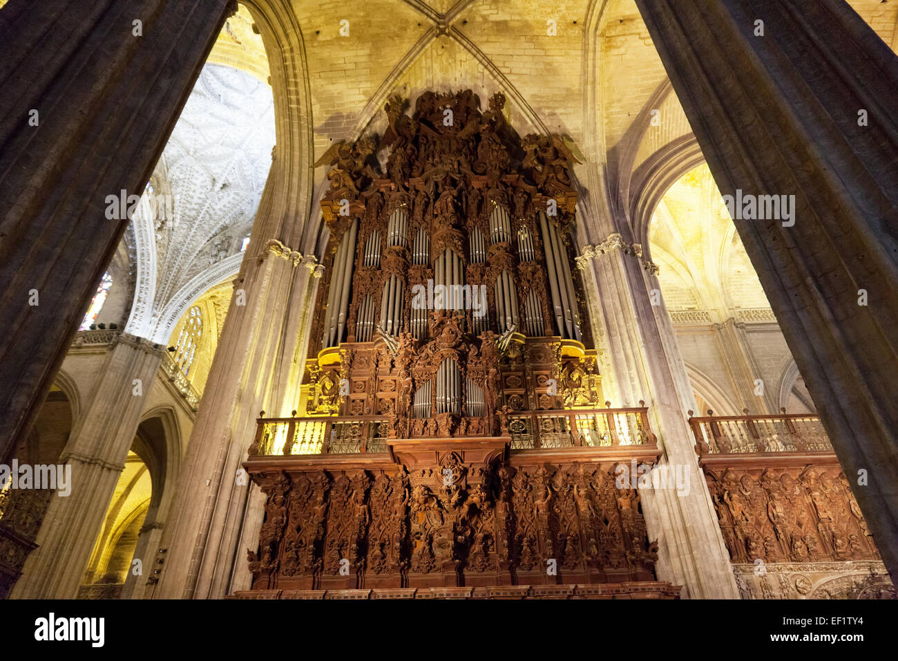 Ancient pipe organ in a cathedral in Seville, Spain Stock Photo