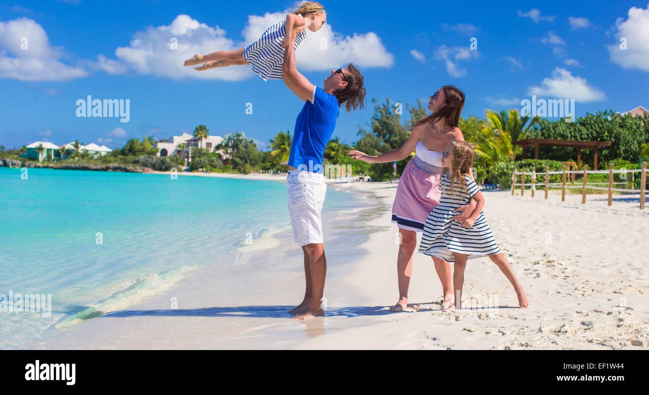 Happy family with two kids on summer vacation Stock Photo - Alamy