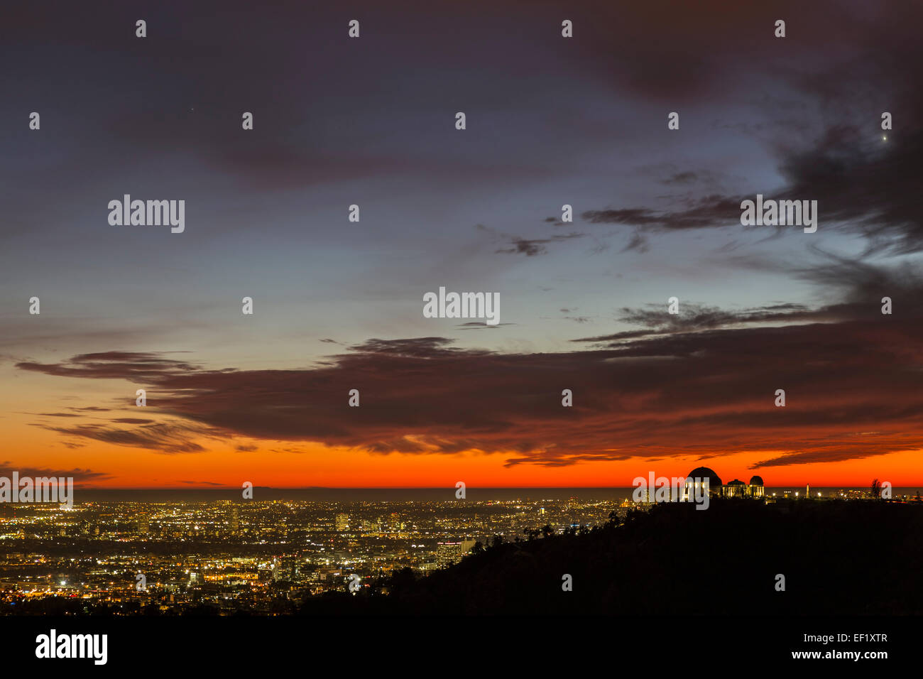 Red sunset cityscape view from Griffith Park in Los Angeles, California. Stock Photo