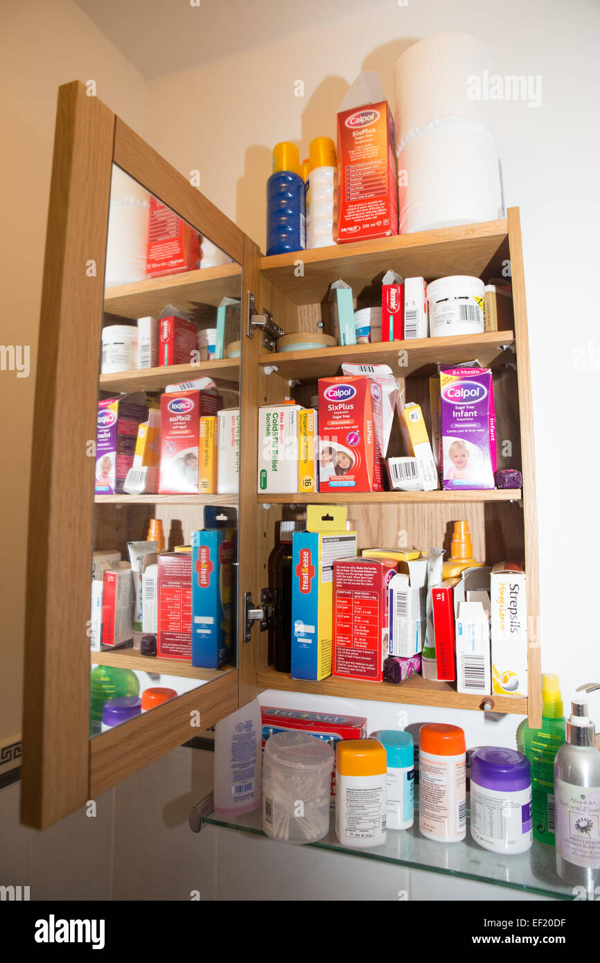 View Of An Open Medicine Cabinet In A Bathroom Stock Photo