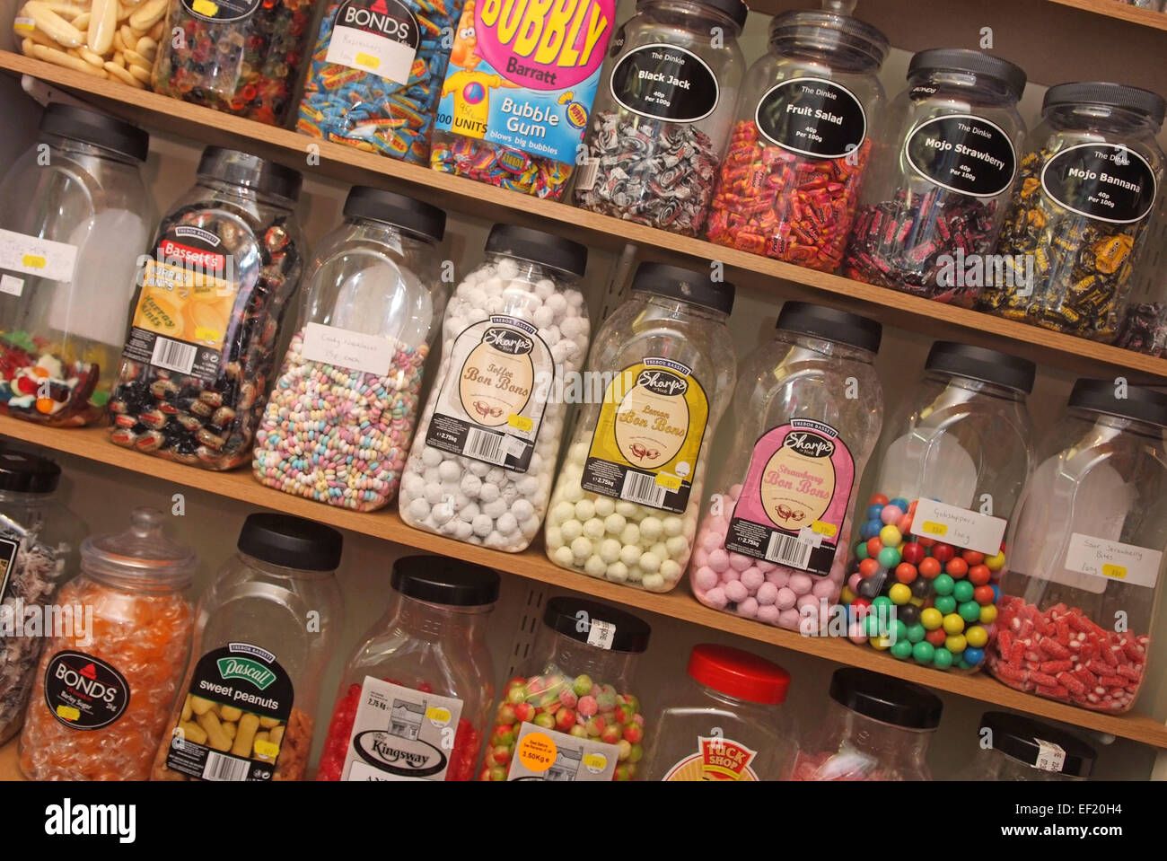 Traditional sweetshop selling in jars,including gobstoppers,toffees,humbugs,and boiled sweets.a UK inflation confectionery child Stock Photo