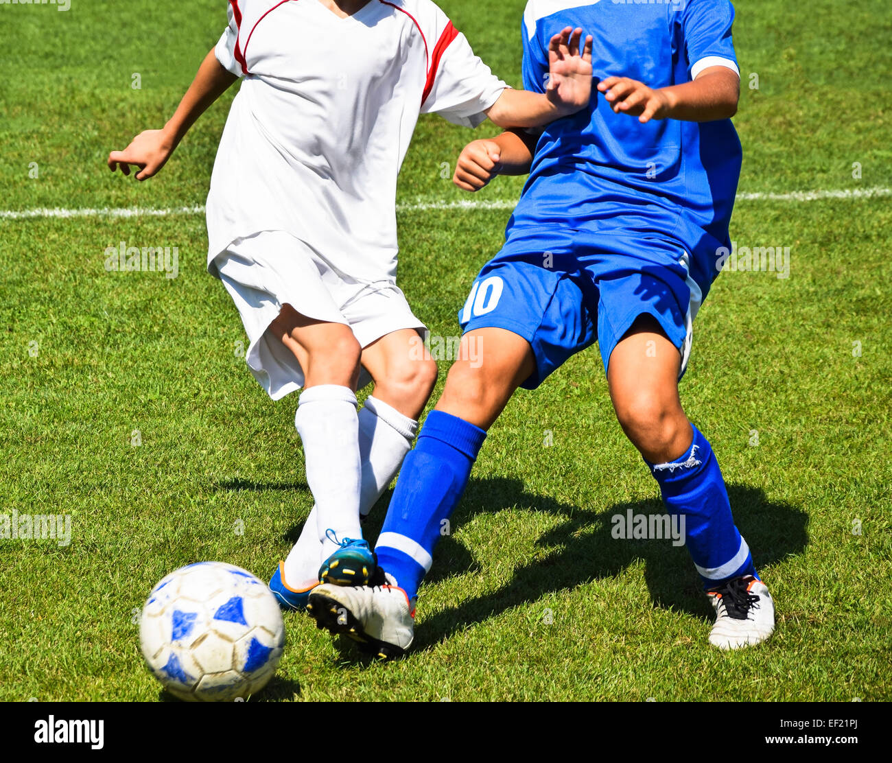Kids are playing soccer Stock Photo Alamy