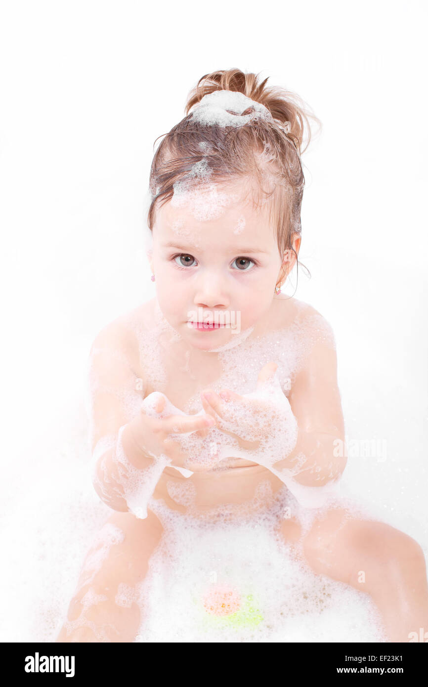 Little girl taking a bath Stock Photo