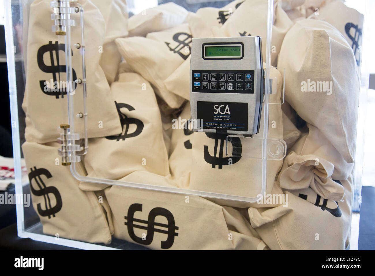 Detroit, Michigan - A radio station displayed money bags, offering $10,000 to anyone who could guess the vault's combination. Stock Photo