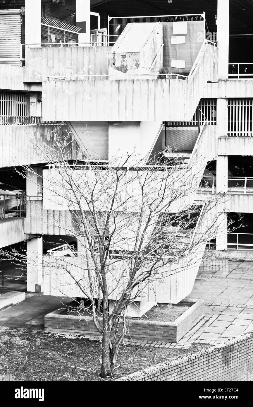 Spiral stone staircase on the edge of a multi-storey car park Stock Photo