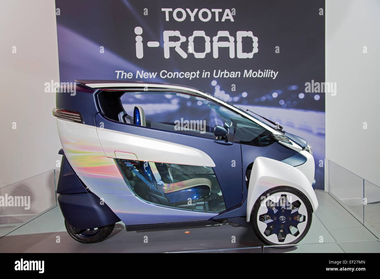 Detroit, Michigan - The Toyota i-ROAD, a two-passenger, three-wheeled electric concept car on display at the Detroit auto show. Stock Photo