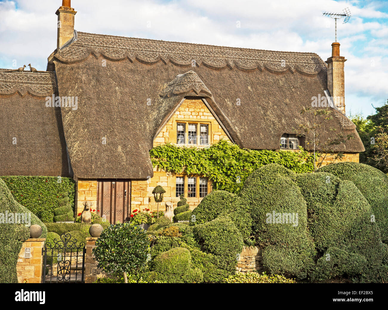 Thatched Cottage in the Cotswolds Stock Photo