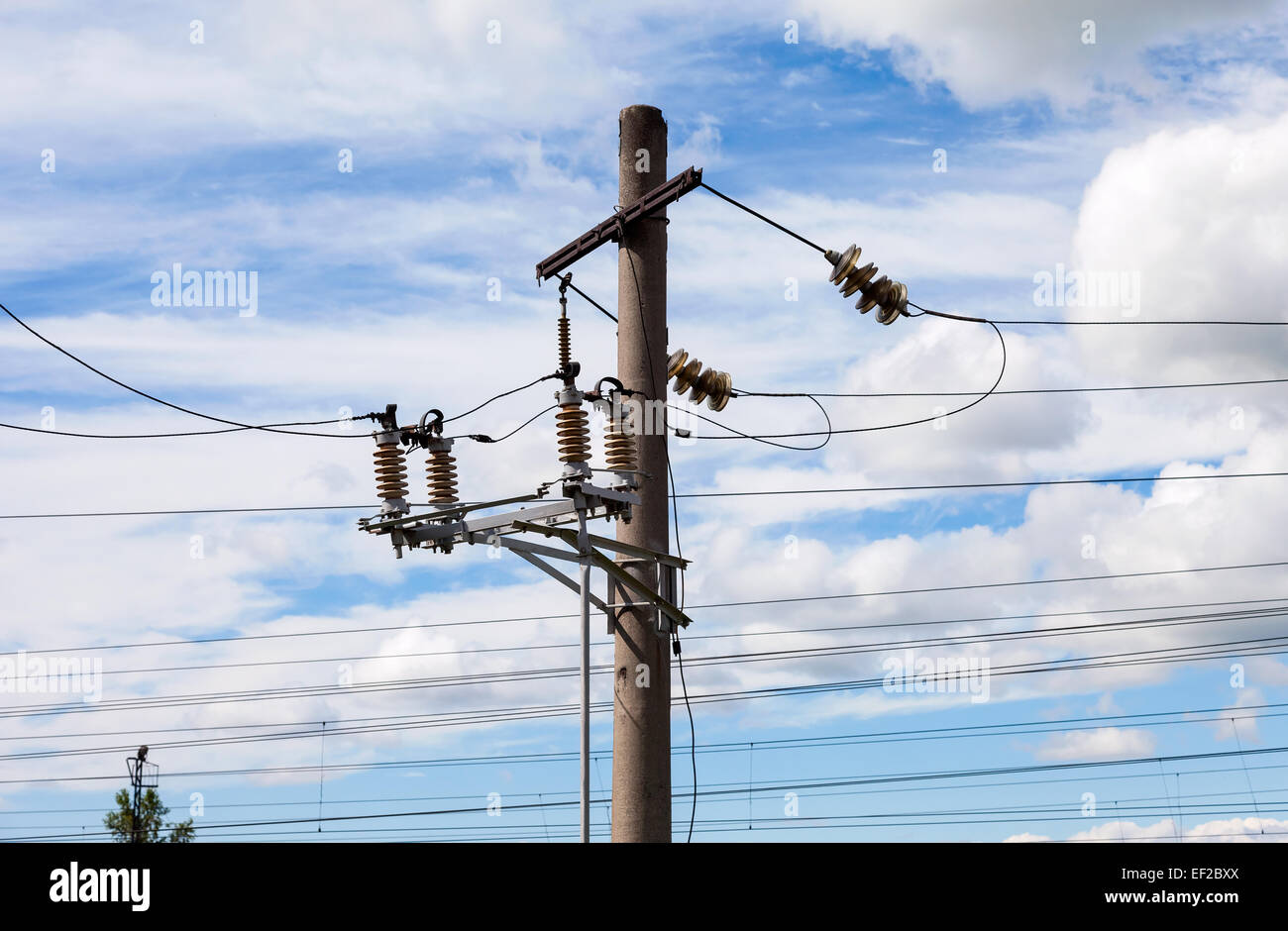 High voltage electricity pylon over cloudy sky Stock Photo - Alamy