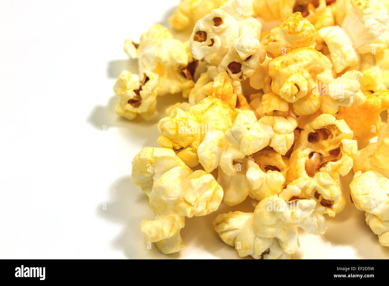 Popcorn snack closeup isolated on white background Stock Photo