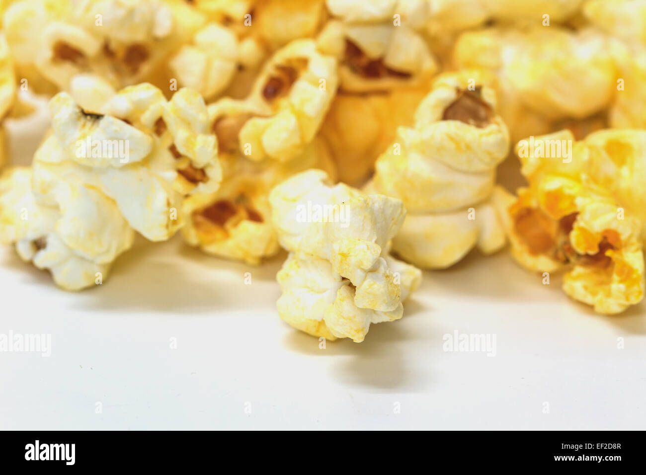 Popcorn snack closeup isolated on white background Stock Photo