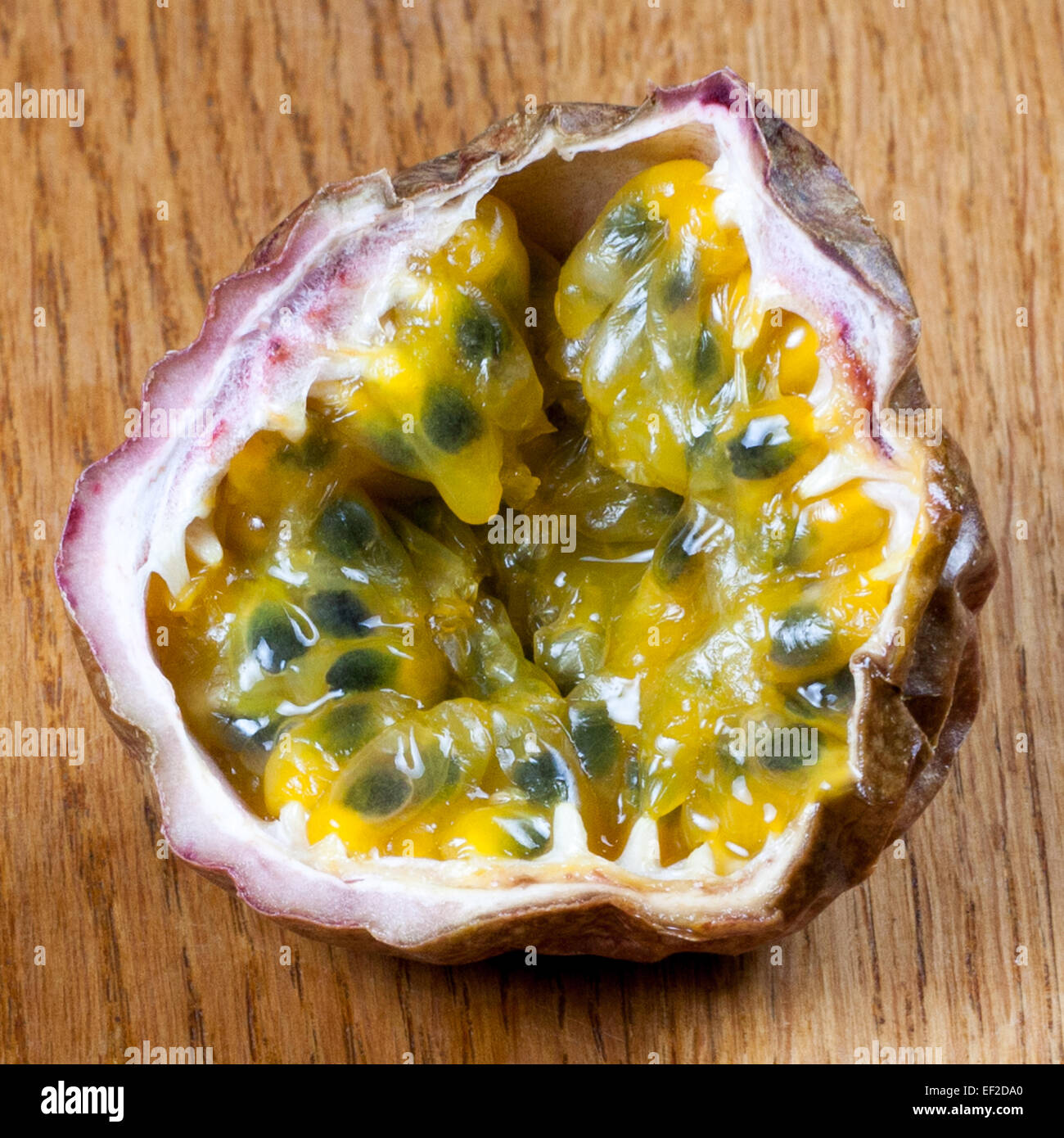 View into a cut passion fruit Stock Photo