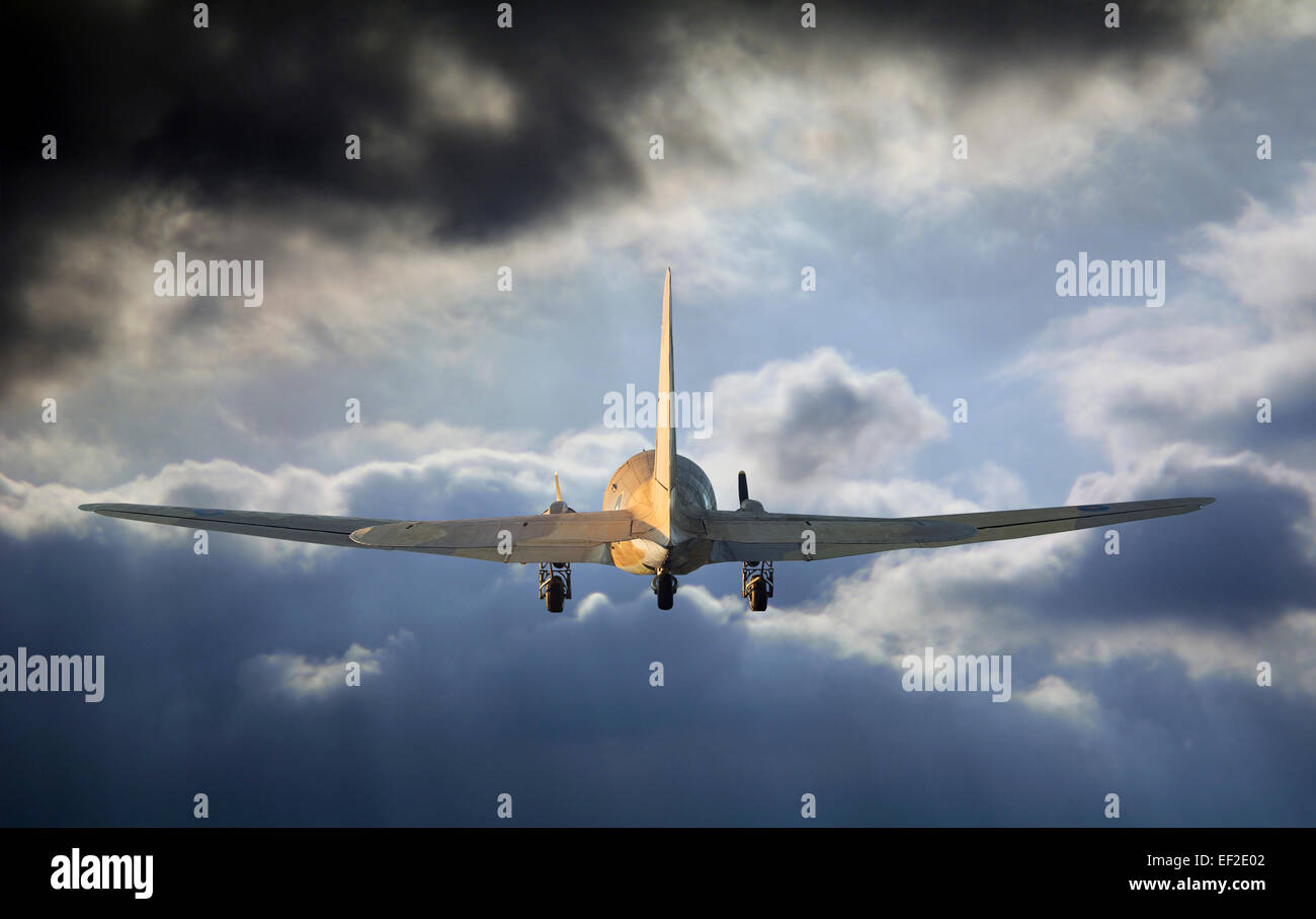 Airplane is flying into the storm Stock Photo - Alamy