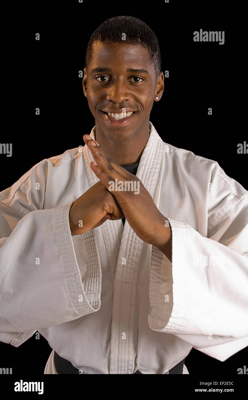 Young man practicing karate Stock Photo - Alamy