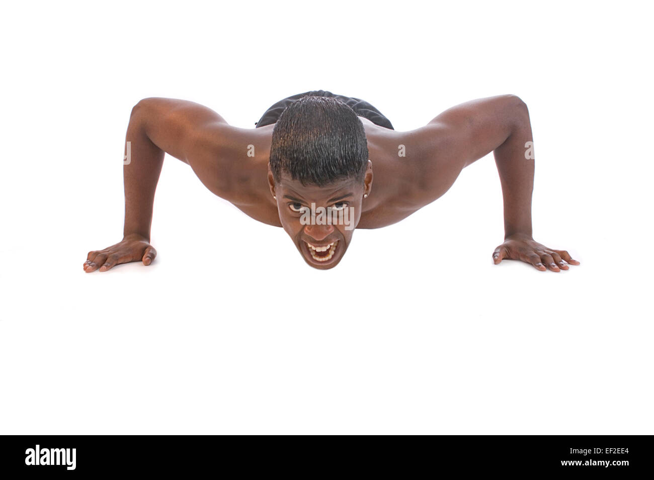 Young man doing push ups Stock Photo - Alamy