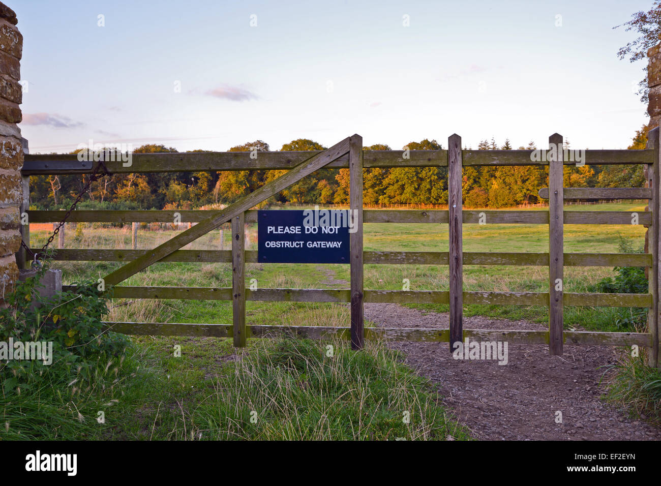 Obstruction sign on gateway to public footpath in countryside Stock Photo