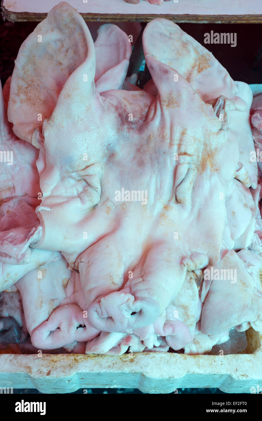 Skinned Pigs Face on sale at Khlong Toey or Toei Food Market Bangkok Stock Photo