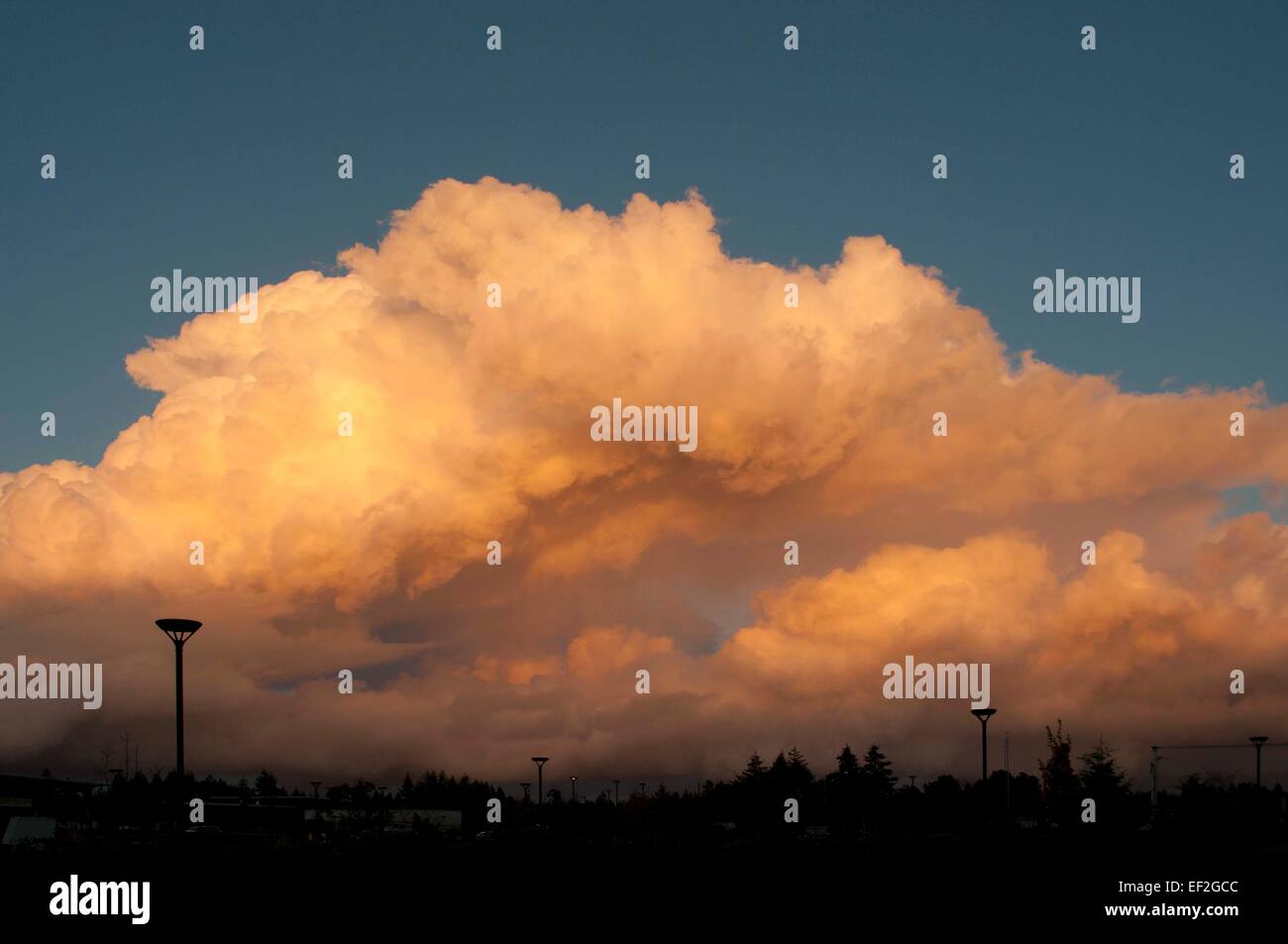 Storm clouds contrasted with blue sky on a November evening in Western Washington State. Stock Photo