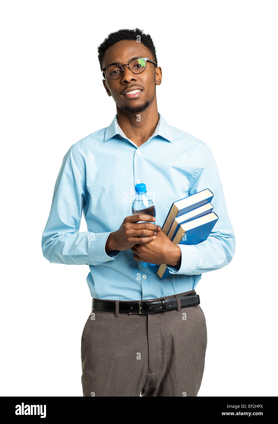 Happy african american college student standing with books and bottle of water in his hands on white background Stock Photo