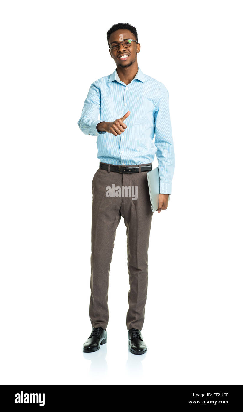 Happy african american college student standing with laptop and finger up on white background Stock Photo