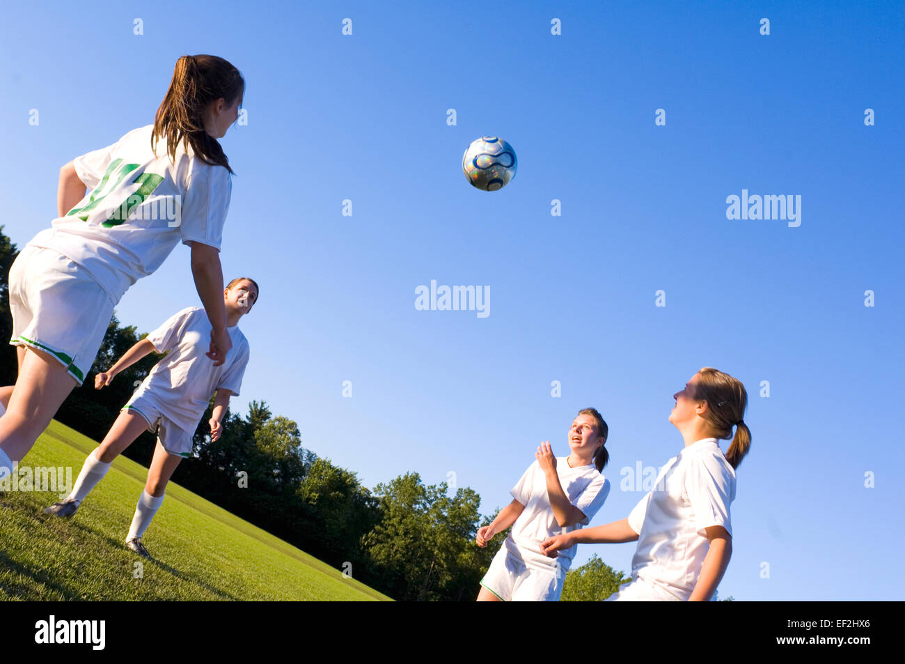 Girls playing soccer Stock Photo
