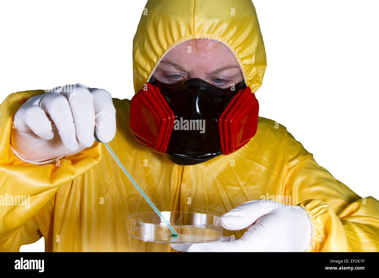Woman dressed in HazMat suit with gas mask and shield with petri dish Stock Photo