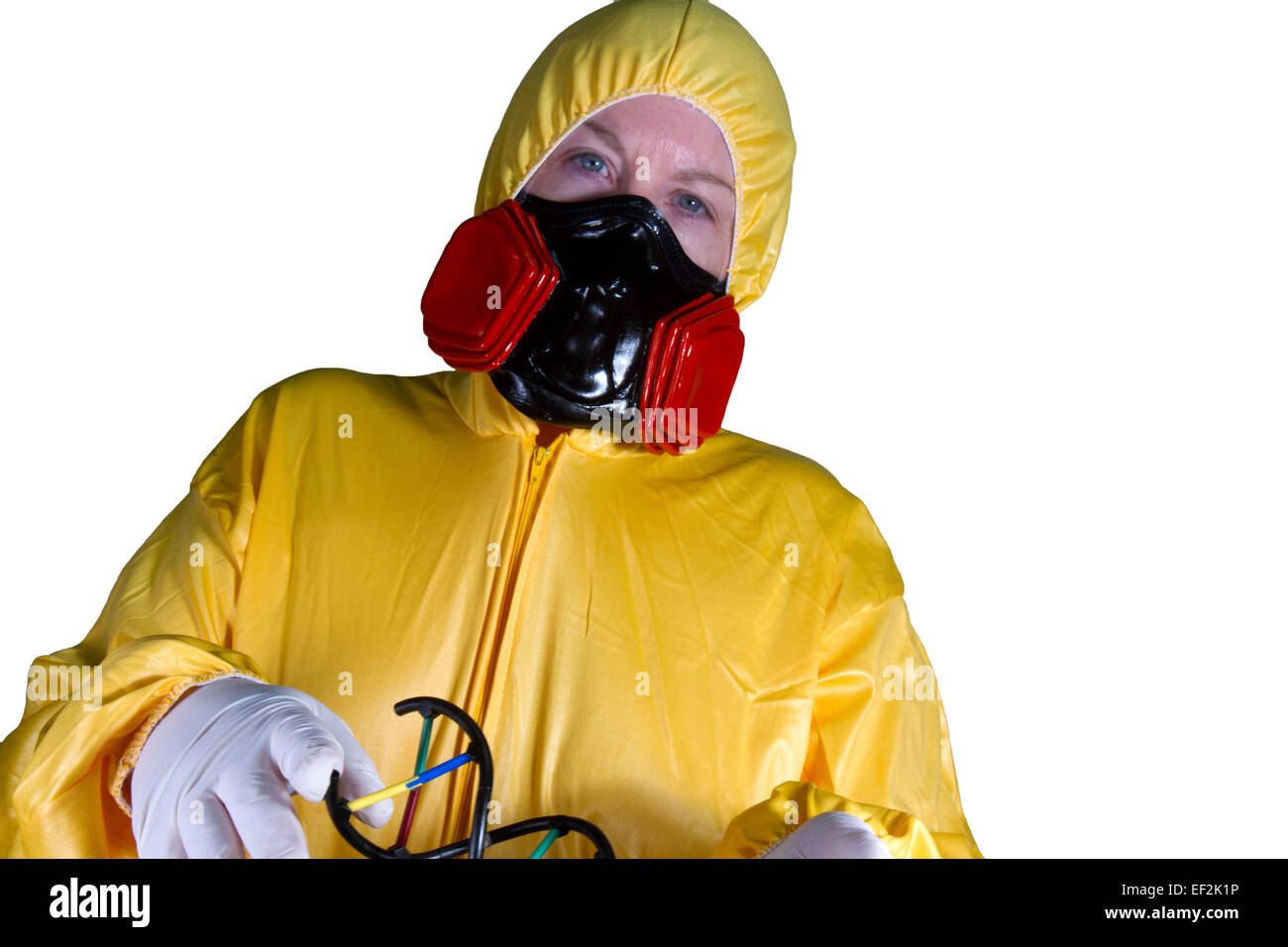 Woman dressed in HazMat suit with gas mask and shield Stock Photo