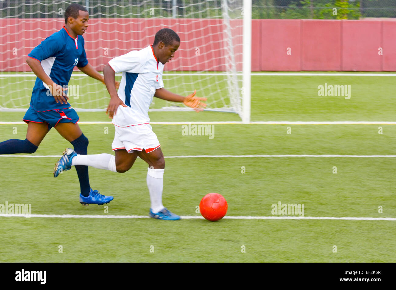 Soccer players playing a game of soccer Stock Photo Alamy