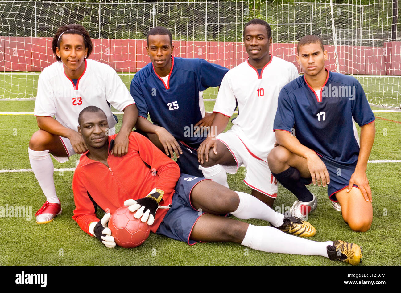 Soccer players on field Stock Photo