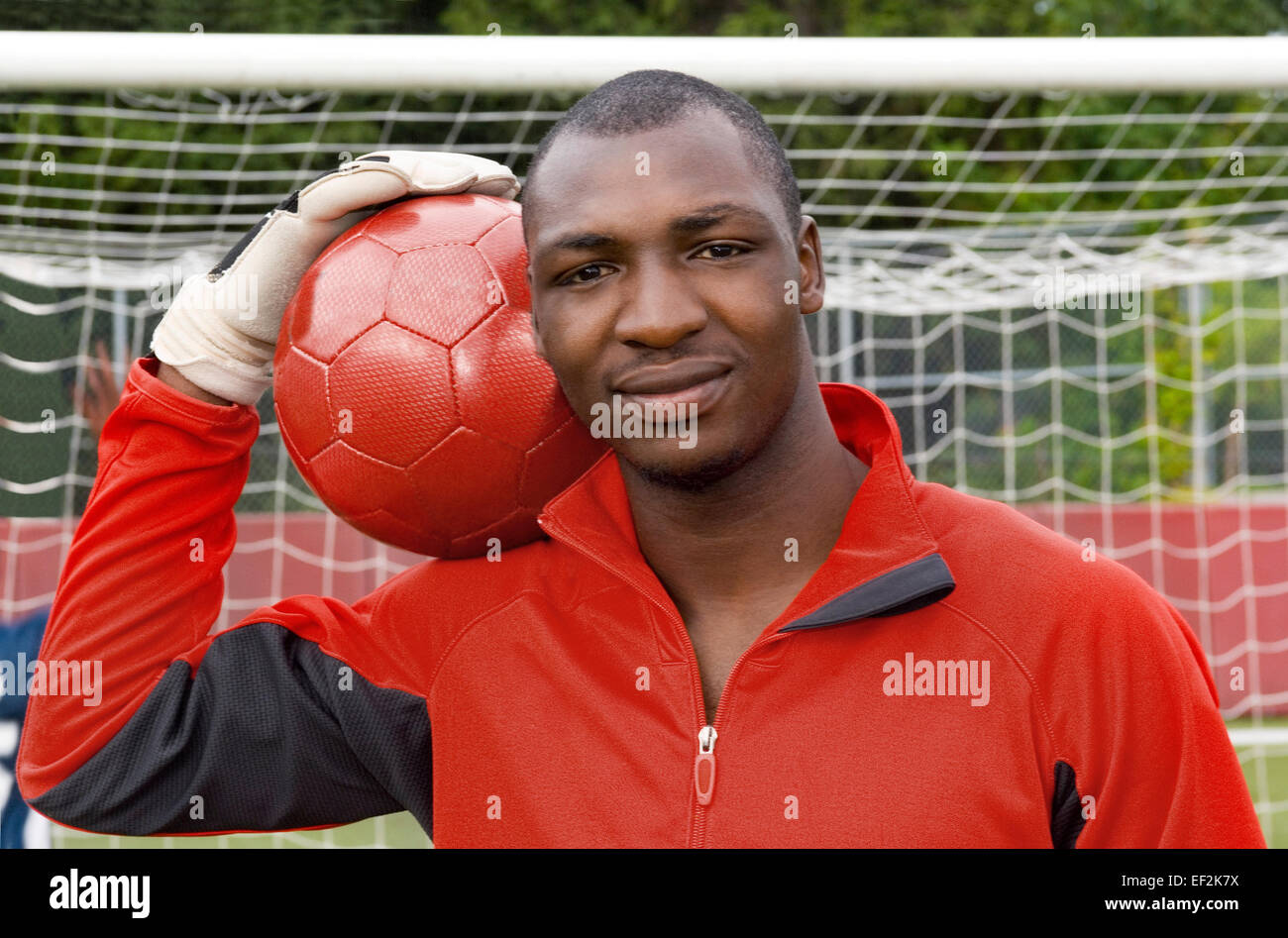 Soccer goalkeeper in net Stock Photo Alamy