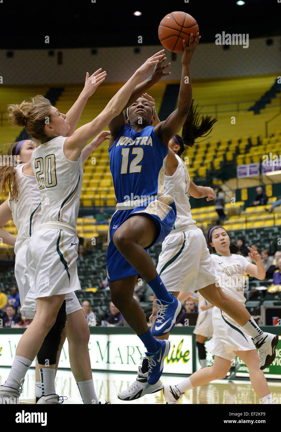 Williamsburg, VA, USA. 25th Jan, 2015. 20150125 - Hofstra guard Darius Faulk (12) drives to the hoop for a score, and also draws a foul on William and Mary guard Kyla Kerstetter (20), in the first half of an NCAA women's basketball game at Kaplan Arena in Williamsburg, Va. William and Mary defeated Hofstra, 57-56. © Chuck Myers/ZUMA Wire/Alamy Live News Stock Photo