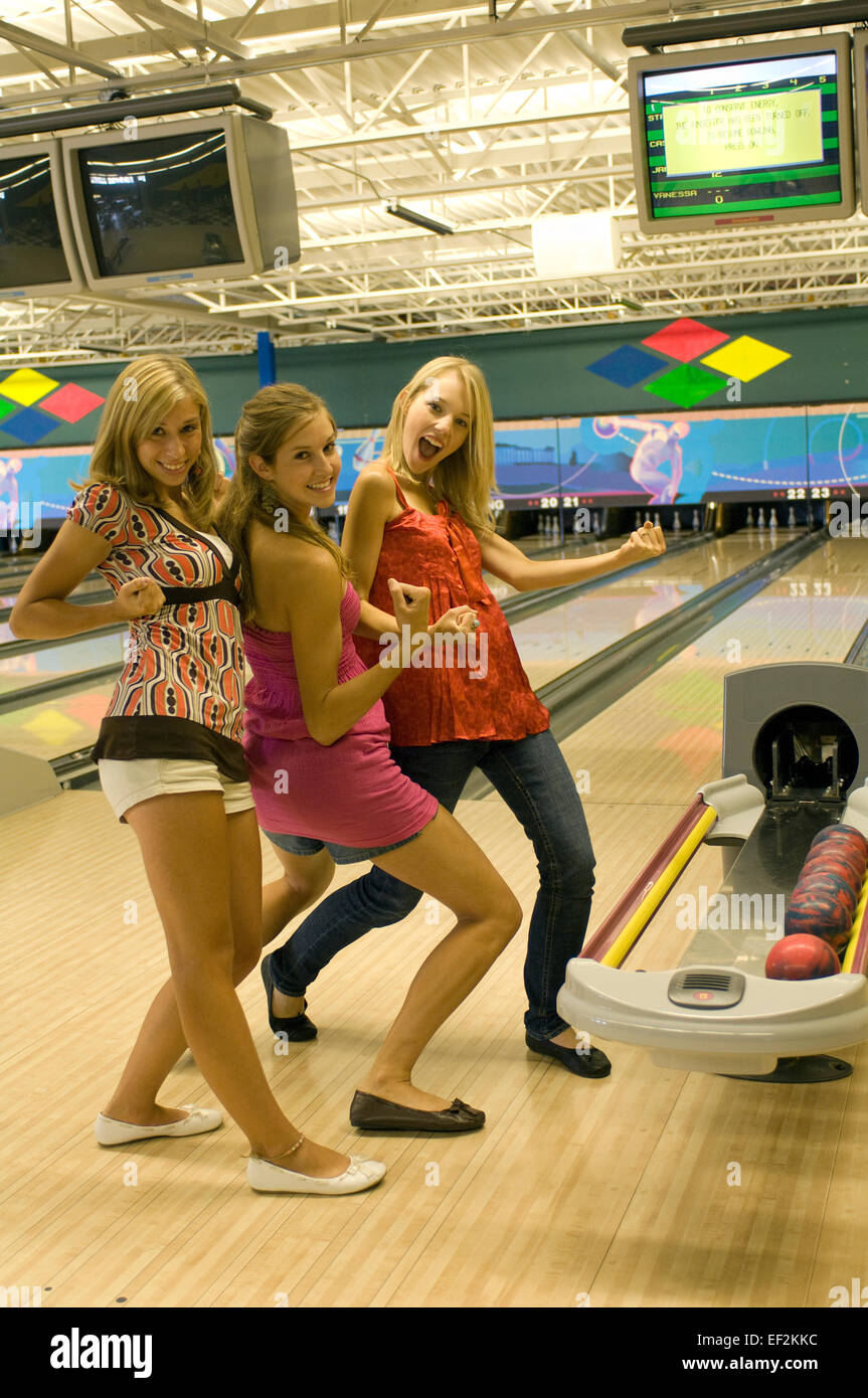Group of girl friends bowling Stock Photo Alamy