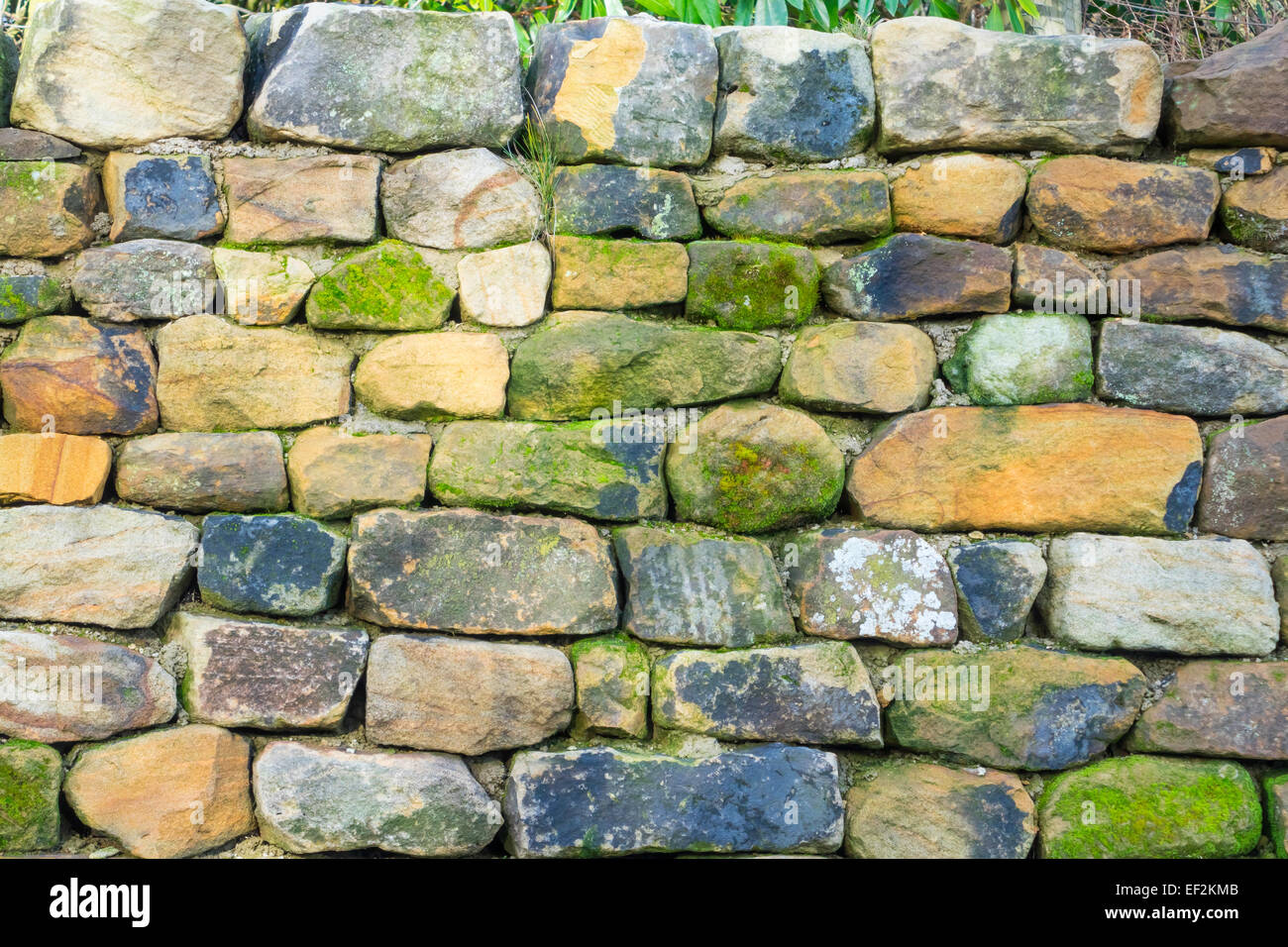 Traditional drystone wall constructed from locally quarried sandstone blocks Stock Photo