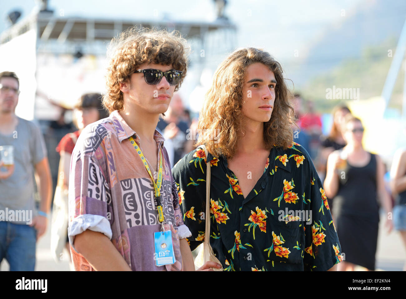 BENICASSIM, SPAIN - JULY 19: Hipsters (modern people) from the audience at FIB Festival on July 19, 2014 in Benicassim, Spain. Stock Photo